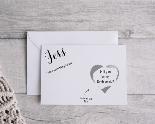 A close-up of a beautifully designed Personalised Surprise Scratch Card featuring intricate patterns and elegant typography, ready to reveal a hidden surprise when scratched.