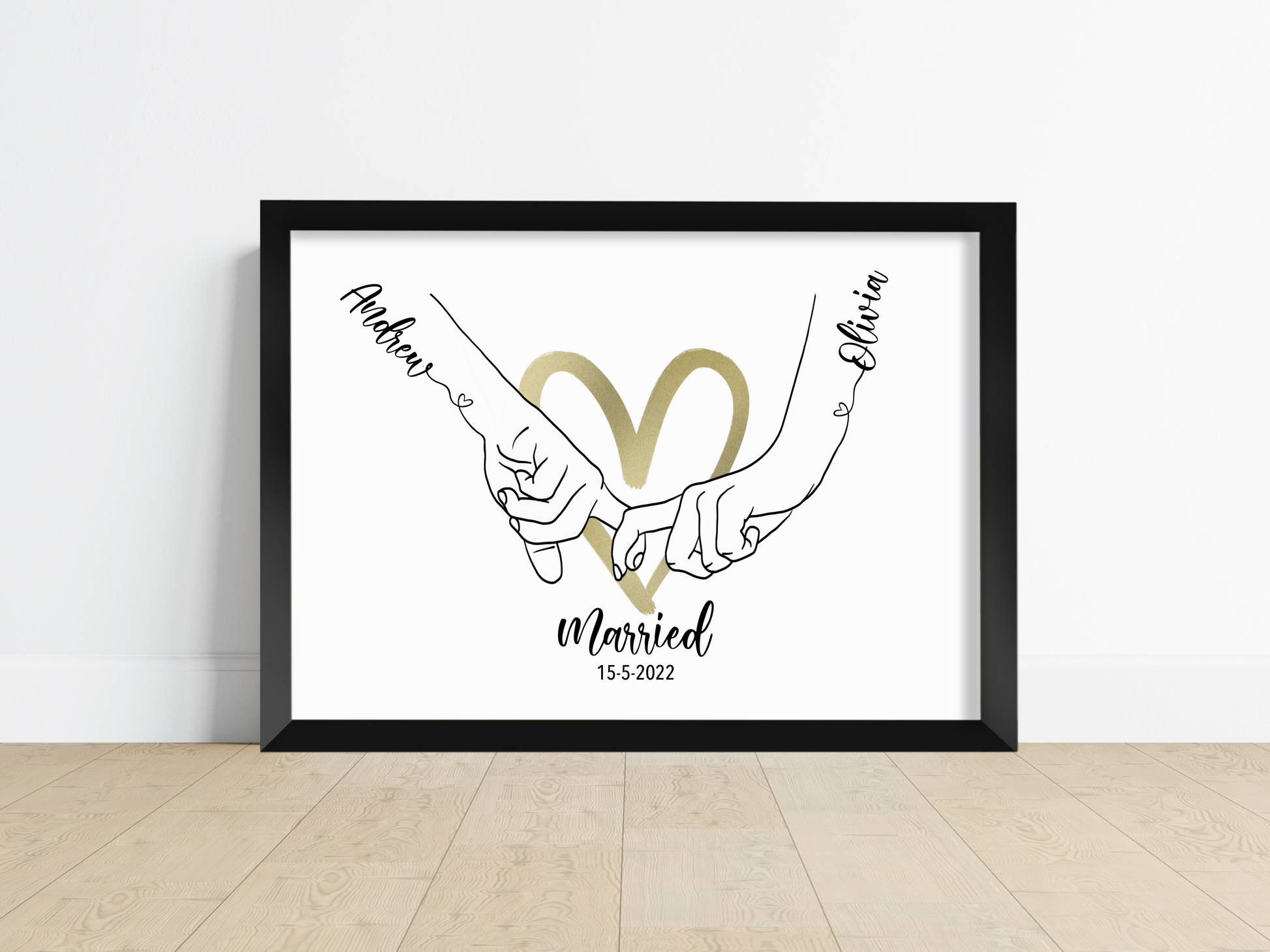 A Personalised Handprint Artwork with Interlocking Hands in the Shape of a Heart, symbolising eternal love and unity. Customisable names integrated into the design. Perfect for weddings, anniversaries, or housewarming gifts, or as a beautiful addition to a family home.